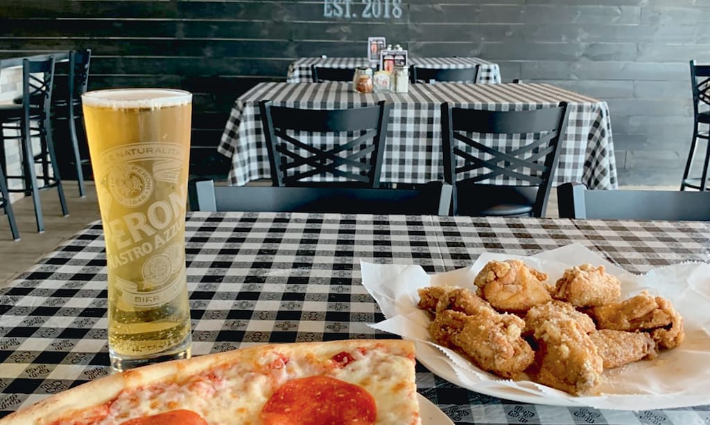 Product image for Perrotta's Pizza $5 off any purchase of $25 or more. 